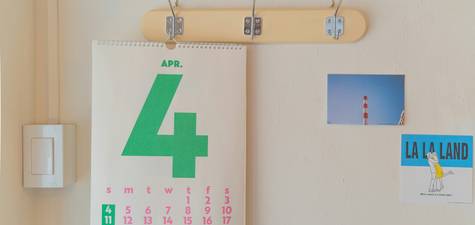 A wall calendar with marked cleaning dates for wood and pellet stoves