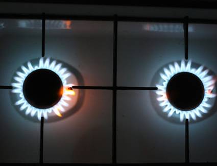 A visual display of different stove fuels with energy efficiency icons