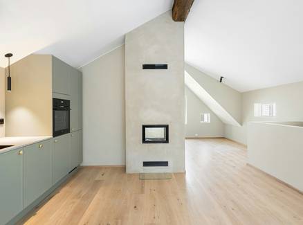 Diagram: compact heating stove installed with vent pipe in a studio apartment or tiny house