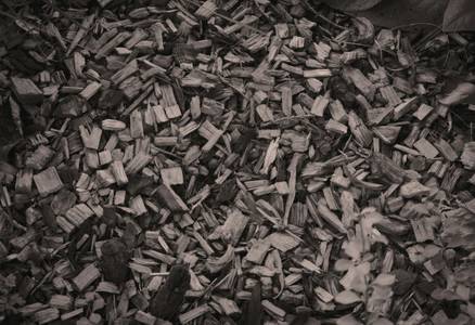 Close-up of wood pellets and a bag of pellet fuel